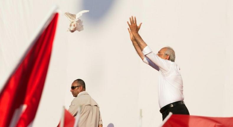 Turkish opposition leader Kemal Kilicdaroglu, seen releasing a dove during Sunday's huge Istanbul rally, Monday visited jailed lawmaker Enis Berberoglu, whose plight his month-long justice march highlighted