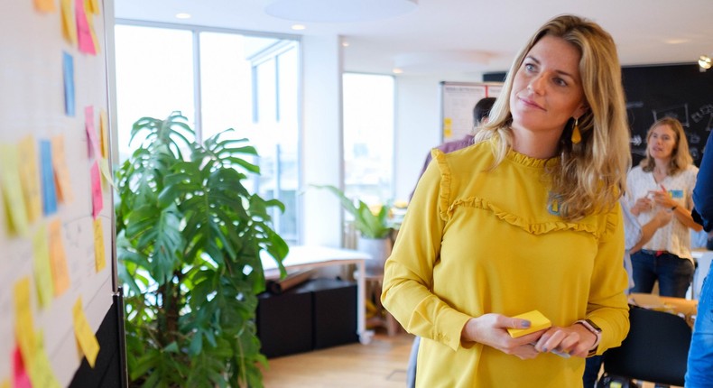 woman working office boss happy smiling