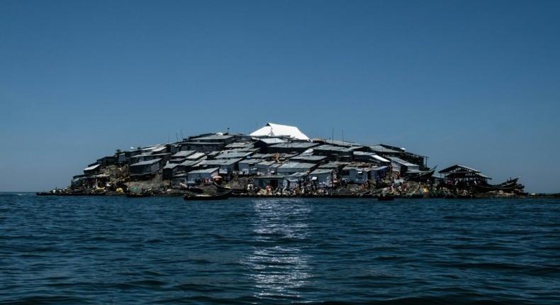 A newly-built tin roof shines on top of Migingo island where its residents fish mainly for Nile perch in Lake Victoria on the border of Uganda and Kenya