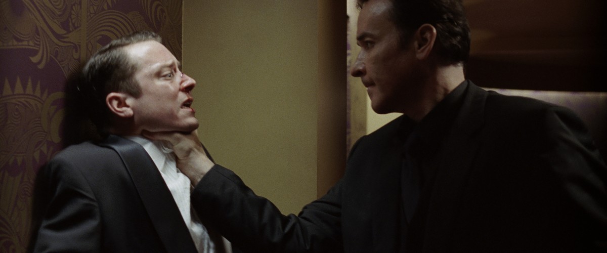 John Cusack i Elijah Wood w filmie 'Wirtuoz'