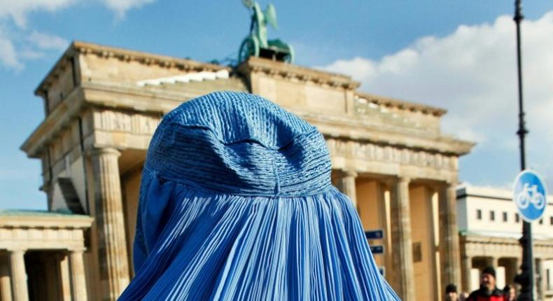 Germany's new law on facial coverings falls short of a total ban in public places demanded by right-wing parties