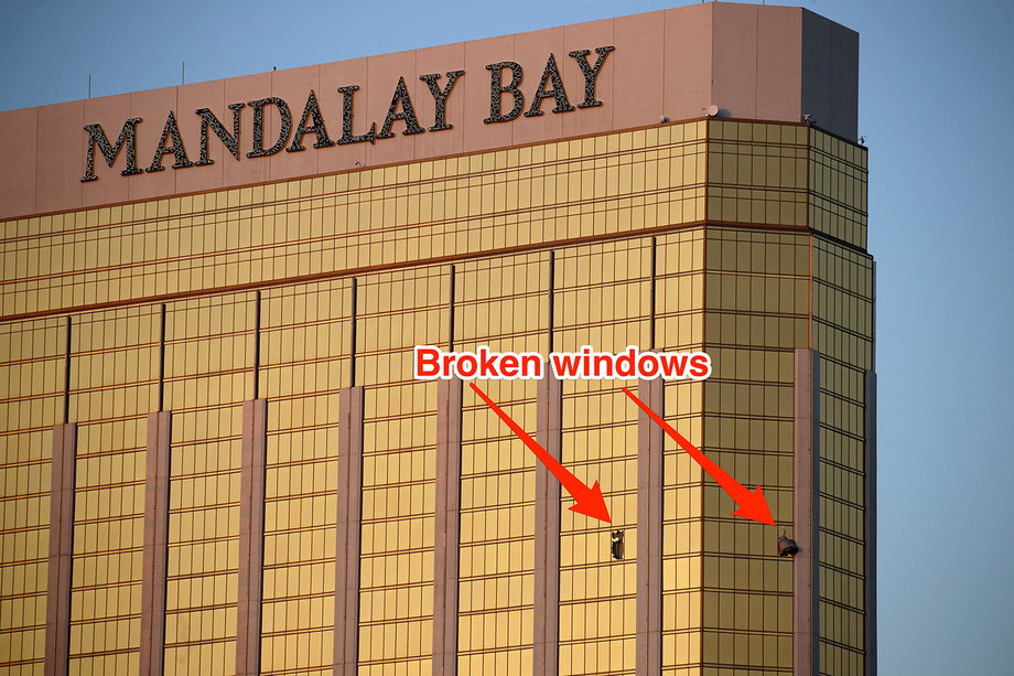 Two broken windows near the top of the Mandalay Bay Resort and Casino, from which a gunman identified by the police as Paddock killed at least 50 people.
