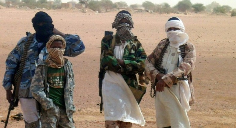 Fighters with the Ansar Dine Islamic group pictured Kidal, northern Mali as Burkina Faso's foreign Minister Djibrille Bassole meets with their leader on August 7, 2012