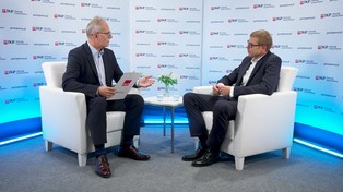 Krzysztof Surma na PreCop 2024: Farmy wiatrowe i magazyny energii zrewolucjonizują polską energetykę