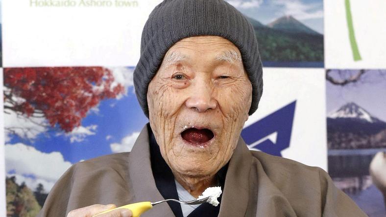 Japanese Masazo Nonaka, who was born 112 years and 259 days ago, eats his favorite cake as he receives a Guinness World Records certificate naming him the world's oldest man during a ceremony in Ashoro, on Japan's northern island of Hokkaido, in this photo taken by Kyodo April 10, 2018. Nonaka died at the age of 113 on January 20, 2019, local media reported. Mandatory credit Kyodo/via REUTERS/File Photo