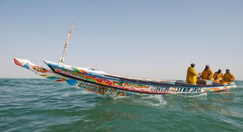 Des pêcheurs en mer