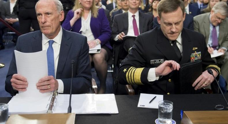 National Security Agency (NSA) Director Michael Rogers (R) and Director of National Intelligence Dan Coats (L) testify before the Senate Intelligence Committee on the probes into Russia meddling in the US election