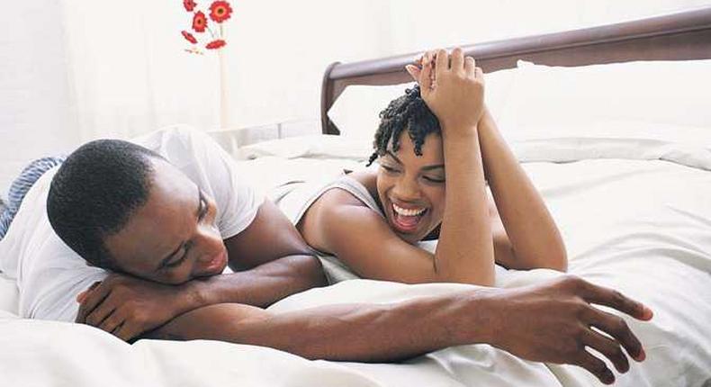 African couple in bed (Opinionated Male)