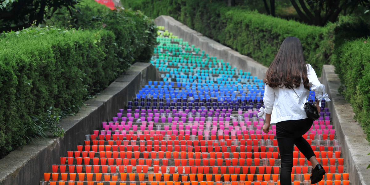 These steps were lined with plastic cups as an art project of four college students in Wuhan in China's Hubei province.