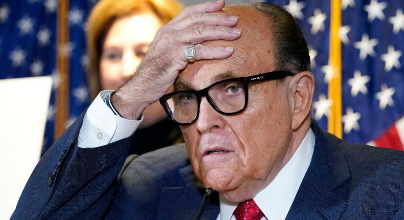 Rudy Giuliani claims he could have fallen, cracked his skull, and died after getting smacked on the back by a ShopRite employee.