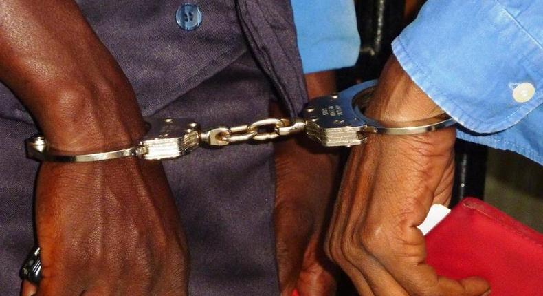 Men in handcuffs