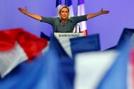 FILE PHOTO: Marine Le Pen, French National Front (FN) political party leader, gestures during an FN political rally in Frejus