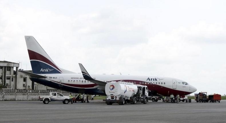 A Boeing 737-7BD Arik Air aeroplane is seen parked on the tarmac at the local airport in Lagos, file. REUTERS/Akintunde Akinleye