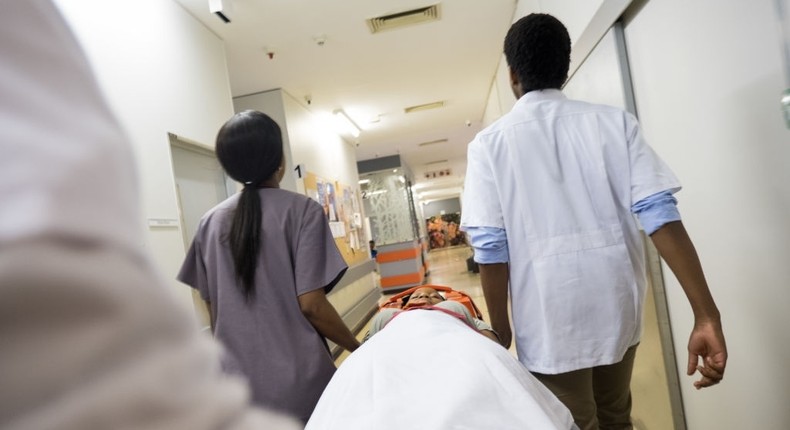 Rushing patient into hospital - stock photo