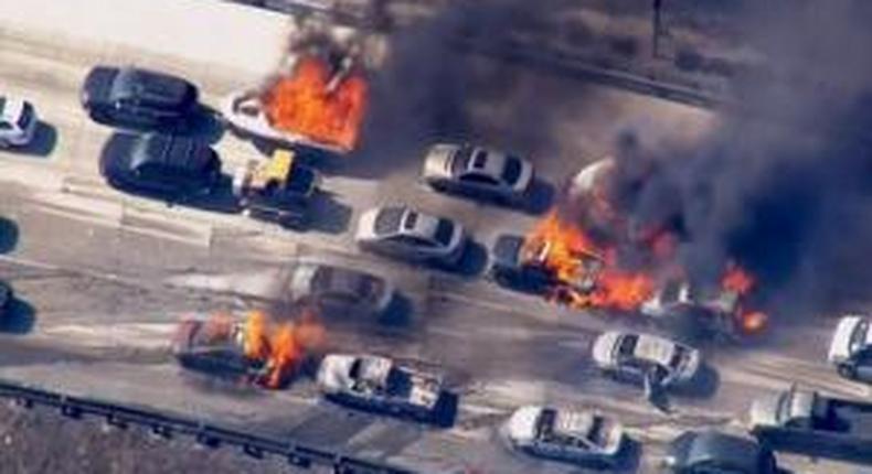 Wildfire overruns packed California freeway, burns cars