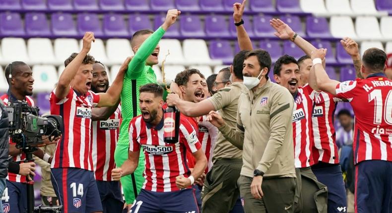 Atletico Madrid's players celebrate after winning the Spanish league Creator: CESAR MANSO