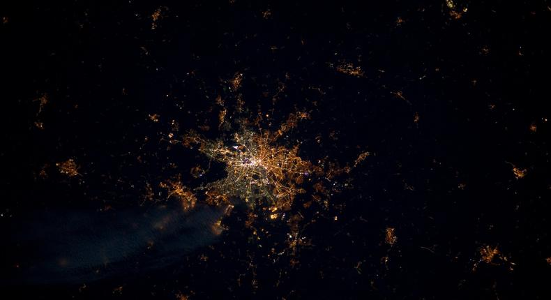 This undated photo provide by the European Space Agency and captured by ESA astronaut Andre Kuipers, shows the German capital Berlin from the International Space Station, ISS. Seen from above, street lights in the former East Berlin appear slightly more orange; those in the western part of the city are a harsher yellow. (
