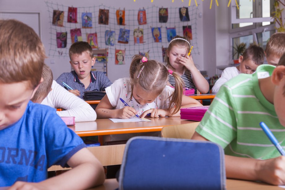 Elementary school students take a grammar test.