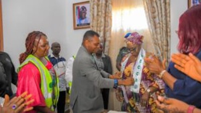 Mrs Eyoawan Otu, Wife of the Gov. of Cross River being inducted as an ECCA Ambassador