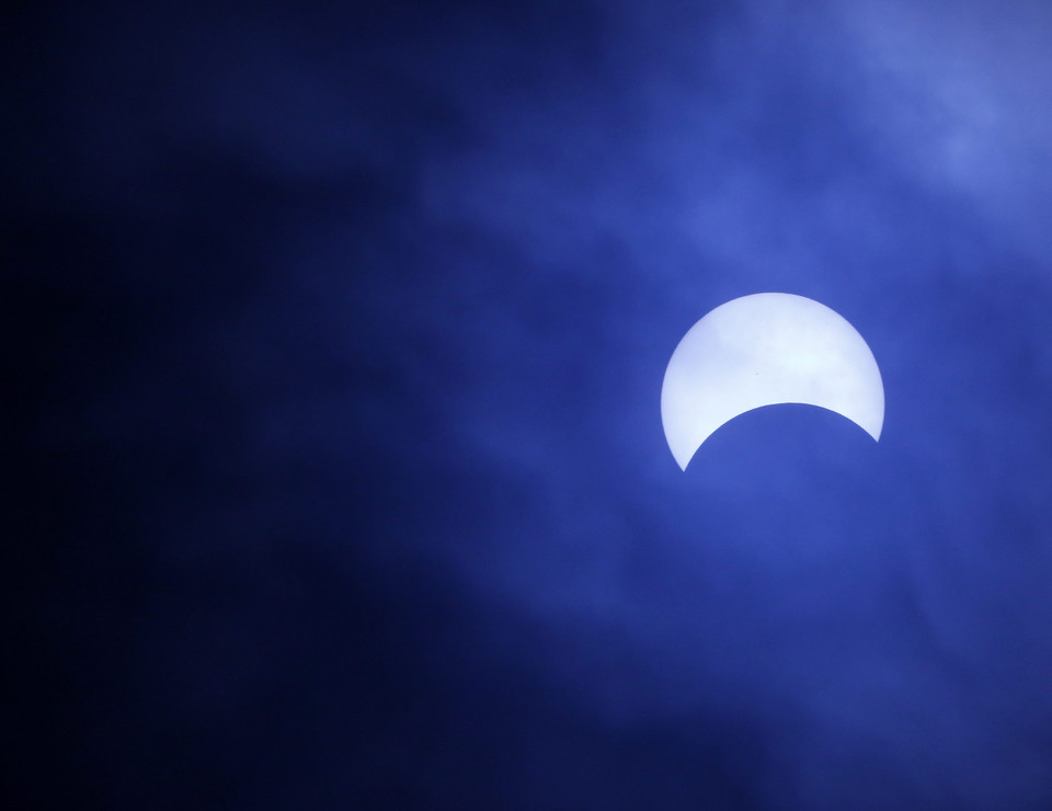 PHILIPPINES SOLAR ECLIPSE (A partial solar eclipse is seen in Manila)