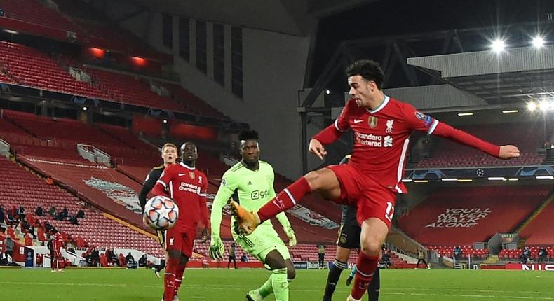 Curtis Jones (right) scored the only goal as Liverpool beat Ajax to reach the Champions League last 16