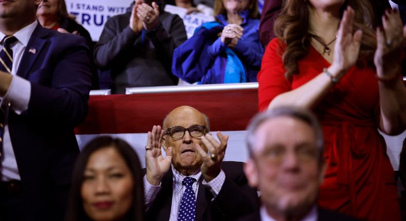 Rudy Giuliani (C) attends a campaign rally for Republican presidential candidate and former President Donald Trump tat the SNHU Arena on January 20, 2024 in Manchester, New Hampshire.Chip Somodevilla/Getty Images
