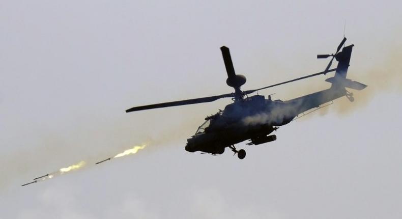 A US-made AH-64E Apache helicopter launches rockets during a live-fire drill in southern Pingtung in August 2016