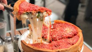 Cheese lovers should be required to try Chicago deep-dish pizza.Supitcha McAdam/Shutterstock