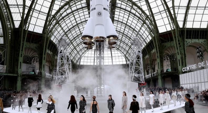 Models present creations by Chanel during the women's Fall-Winter 2017-2018 ready-to-wear collection fashion show at the Grand Palais in Paris