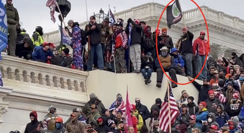 Languerand pictured holding a Pepe the frog flag on the Upper West Terrace on January 6, 2021.