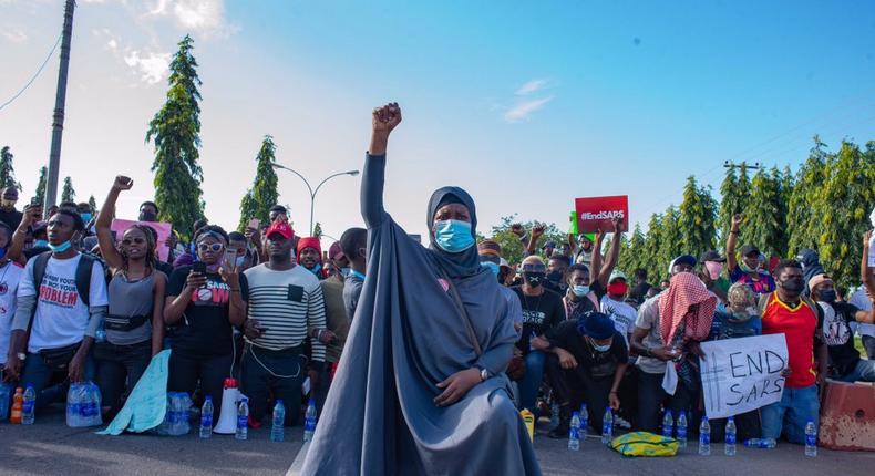 Aisha Yesufu's iconic photo of the EndSARS protests in Nigeria (Premium Times)