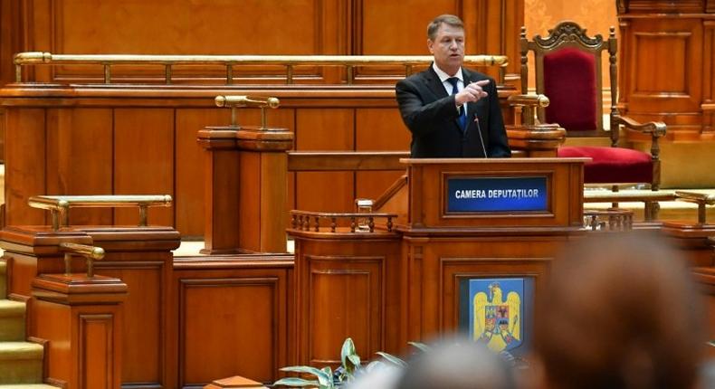 Romanian President Klaus Iohannis adresses the Romanian Parliament in Bucharest on February 7, 2017