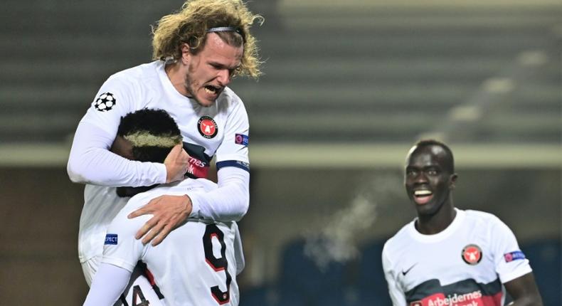 Midtjylland's Scholz (L) scored the opening goal against Atalanta