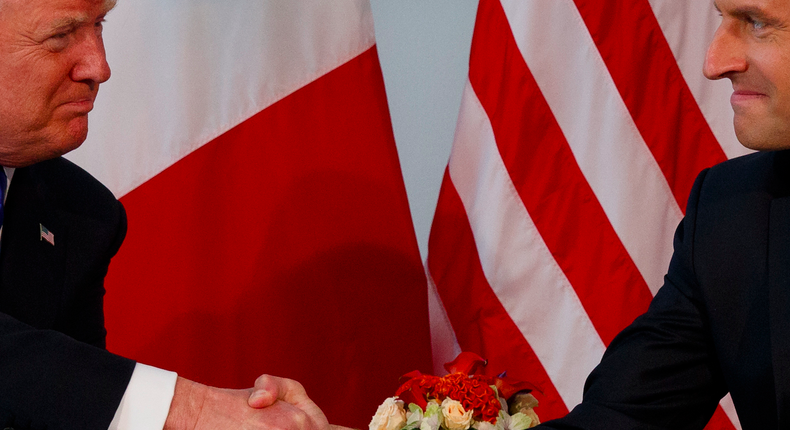 President Donald Trump shakes hands with French President Emmanuel Macron on May 25.