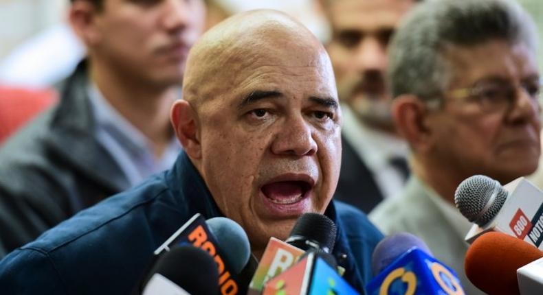 Jesus Torrealba, secretary general of the main opposition coalition, the Democratic Unity Roundtable, speaks during a press conference in Caracas on November 2, 2016