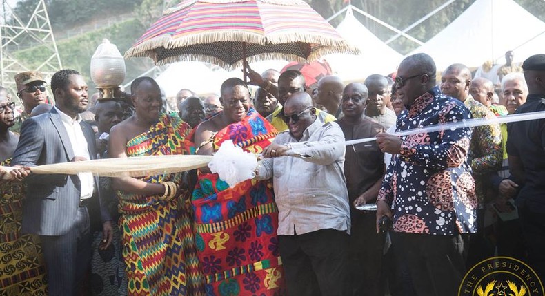 President Akufo-Addo and Asantehene cutting tape to reopen the mine