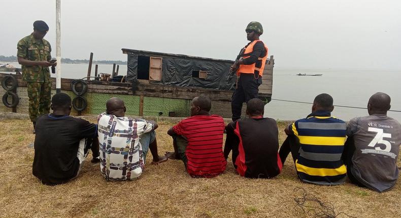 Suspected crude oil thieves arrested by the Nigerian Navy in collaboration with the Cameroonian Navy [NAN]