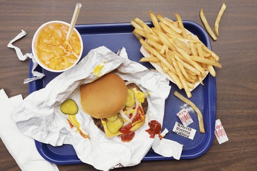 Elevated View of a Tray With Fries, a Hamburger and Lemonade