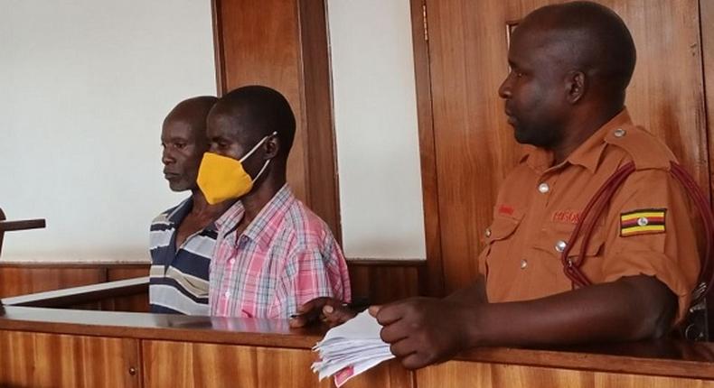 Vincent Tumuhirwe and Robert Ariyo being sentenced 