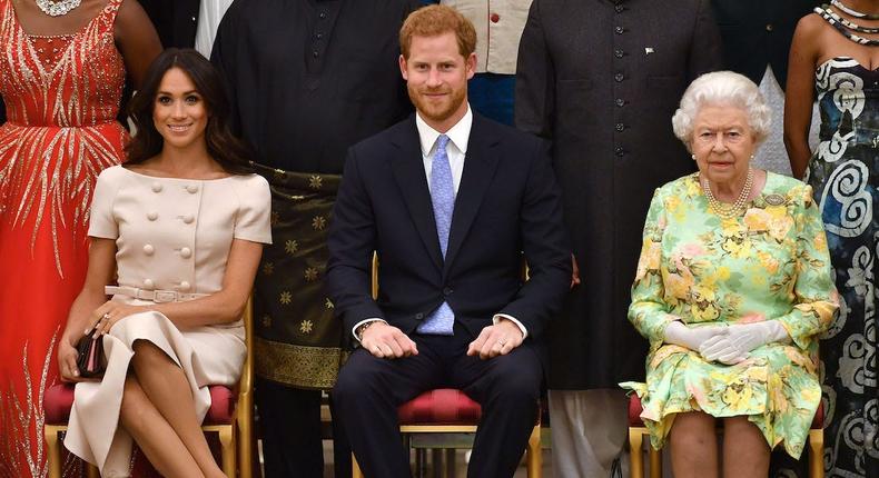 Meghan Markle, Prince Harry, and Queen Elizabeth photographed in June 2018.John Stillwell/WPA Pool/Getty Images