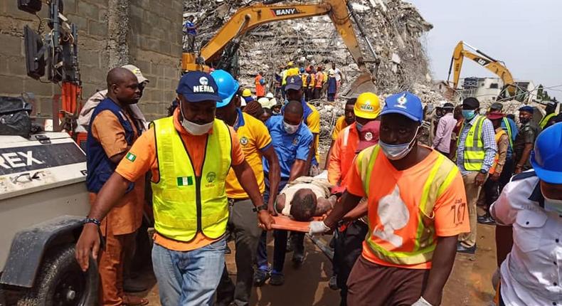 A survivor rescued from the rubble of the building that collapsed in Ikoyi, Lagos [LASEMA]