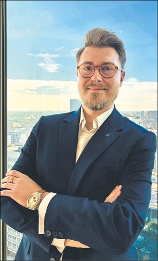 Łukasz Akuczonek, project manager w zespole Immigration EY Polska