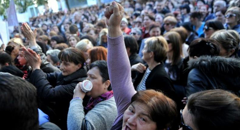 Women gather for a protest on February 16, 2017 in Podgorica over social benefits cuts affecting mothers with three or more children, introduced as the country is facing growing public finances problems