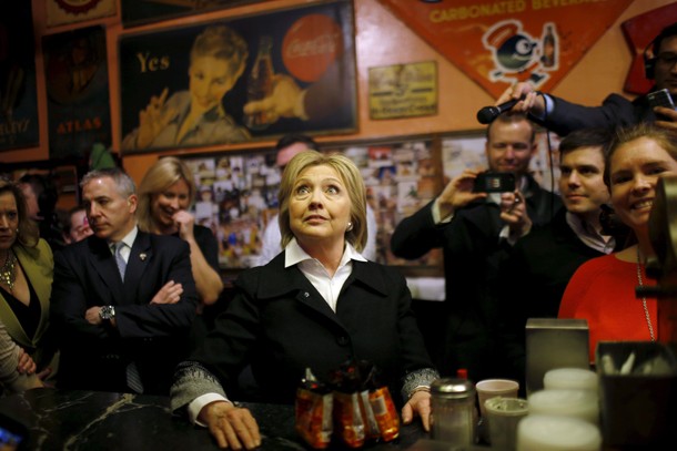 U.S. Democratic presidential candidate Hillary Clinton looks at the menu during a campaign stop at Y