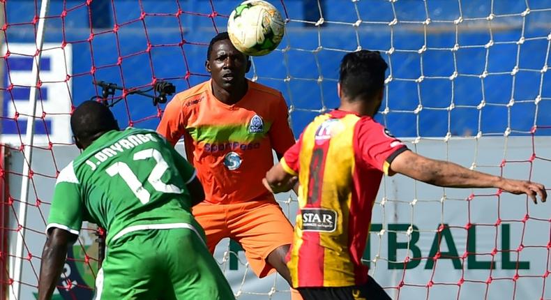 Gor Mahia goalkeeper Boniface Oluoch made a string of saves as the Kenyan club held New Star 0-0 in Cameroon to reach the CAF Confederation Cup group stage