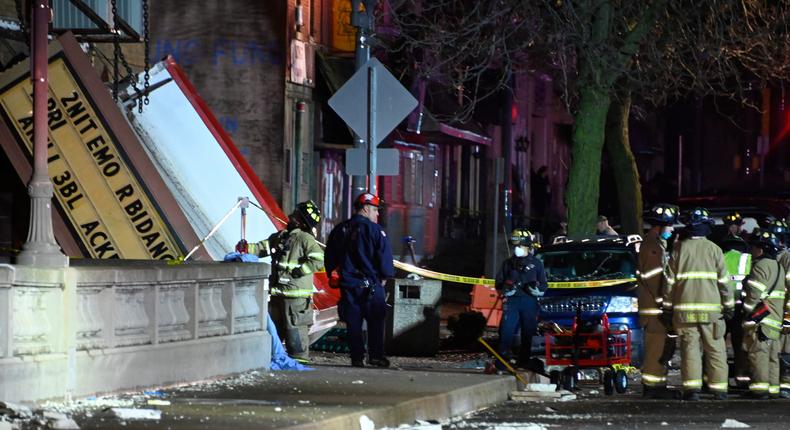 Authorities work the scene at the Apollo Theatre in Belvidere, Illinois, after a storm caused damage and injuries during a concert on March 31, 2023.Matt Marton/AP