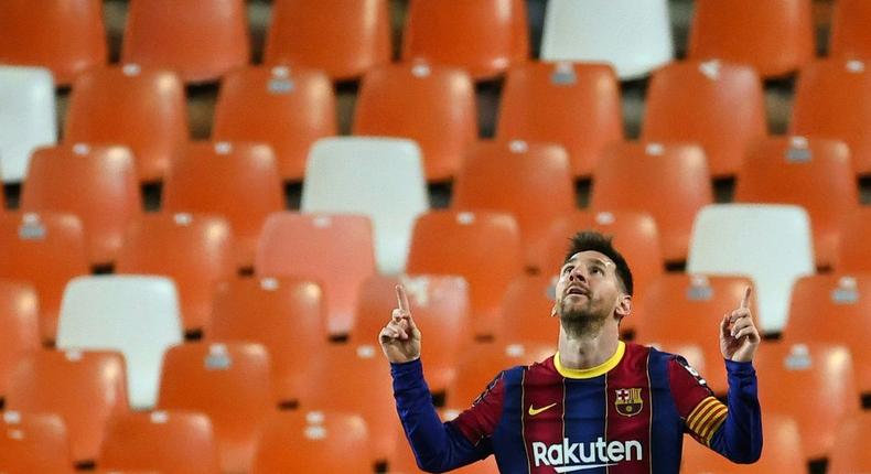 Messi celebrates his double at Valencia the day before hosting a party for his Barcelona teammates Creator: JOSE JORDAN