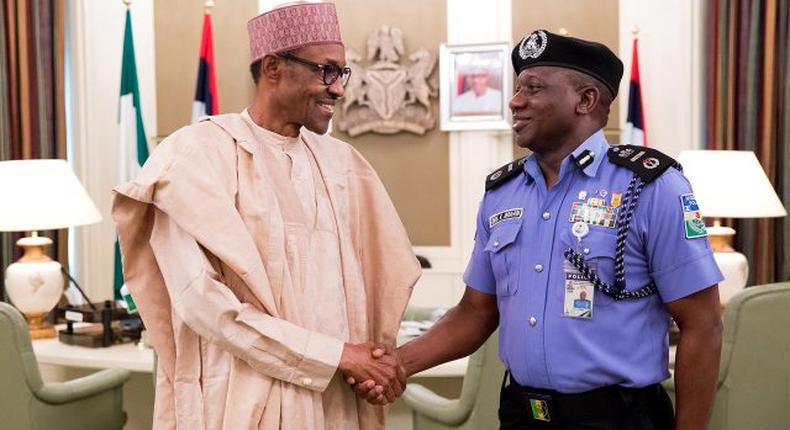 President Muhammadu Buhari and the Inspector-General of Police, Ibrahim Idris at the Presidential Villa, Abuja.