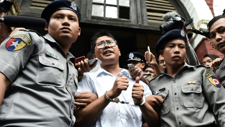 Reporters Wa Lone, pictured, and Kyaw Soe Oo, were arrested in Yangon in December 2017 and later sentenced to seven years in jail for violating the state secrets act, a charge supporters say is trumped up