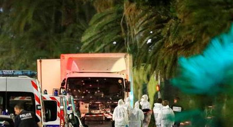 Britain warns citizens after truck attack kills 73 in France.